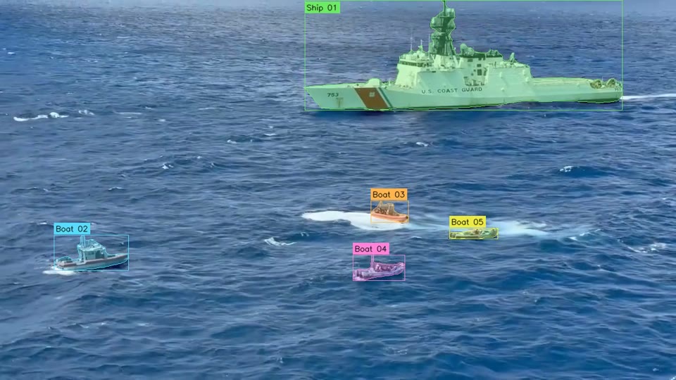 Vessels on open water, with coloured masks and object labels marking the boats.